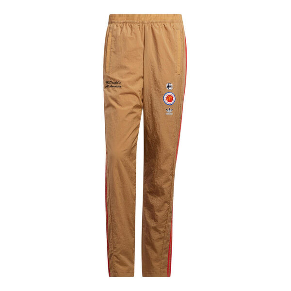 

Спортивные штаны Men's adidas originals x Eric Emanuel Crossover Stripe Basketball Sports Pants Khaki, хаки