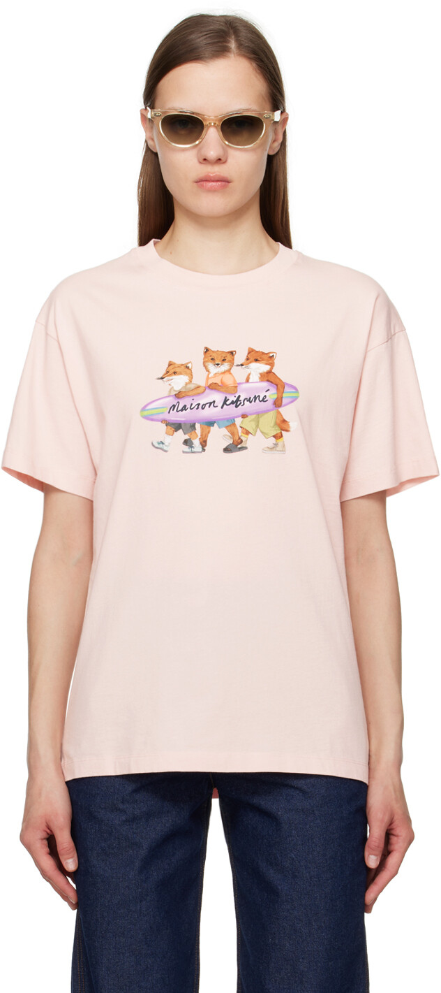 

Розовая футболка с изображением лис-серфингистов Maison Kitsune
