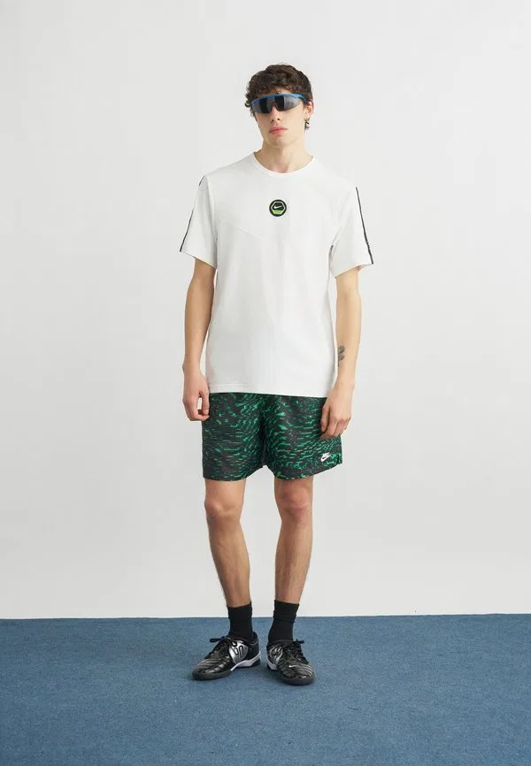 Спортивные штаны в стиле научной фантастики club flow Nike Sportswear, Malachite/Black/Sail — фото 2