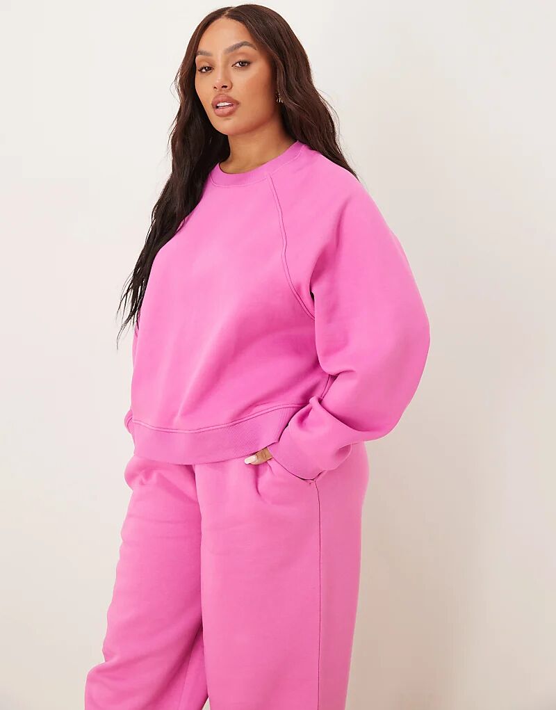 

Толстовка свободного кроя ASOS DESIGN Curve с начесом сзади и отделкой реглан розового цвета Asos Curve