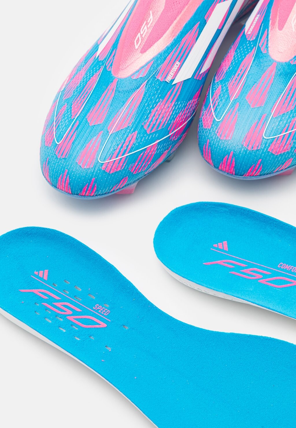 

Бутсы F50 ELITE LACELESS FIRM GROUND adidas, синий