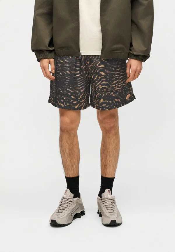 Спортивные штаны в стиле научной фантастики club flow Nike Sportswear, Tattoo/Black/Orange Frost — фото 4