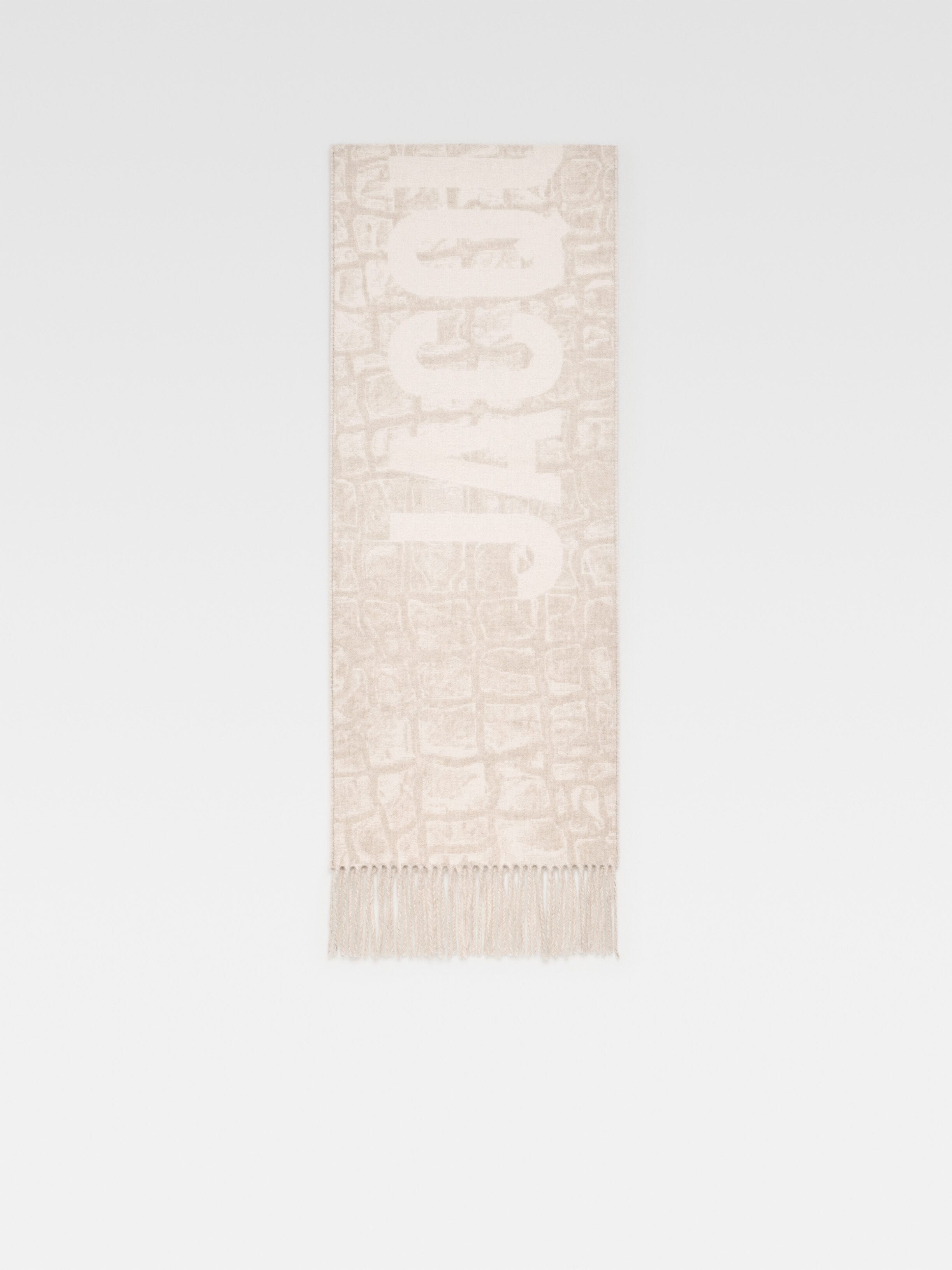 

Шарф с бахромой и логотипом JACQUEMUS The Jacquemus scarf, бежевый