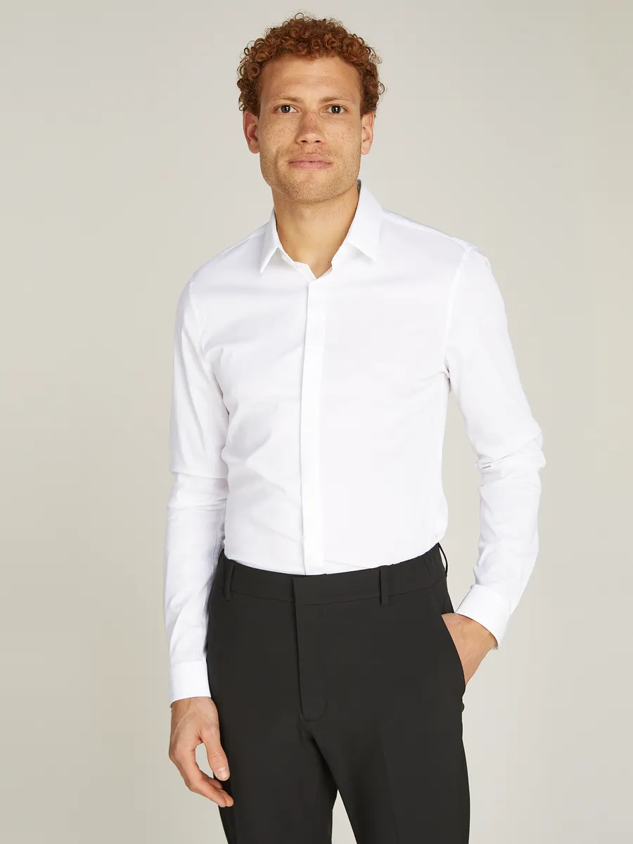 

Рубашка Calvin Klein с длинными рукавами "POPLIN HP EXTRA SLIM SHIRT" и вышитым логотипом, белый