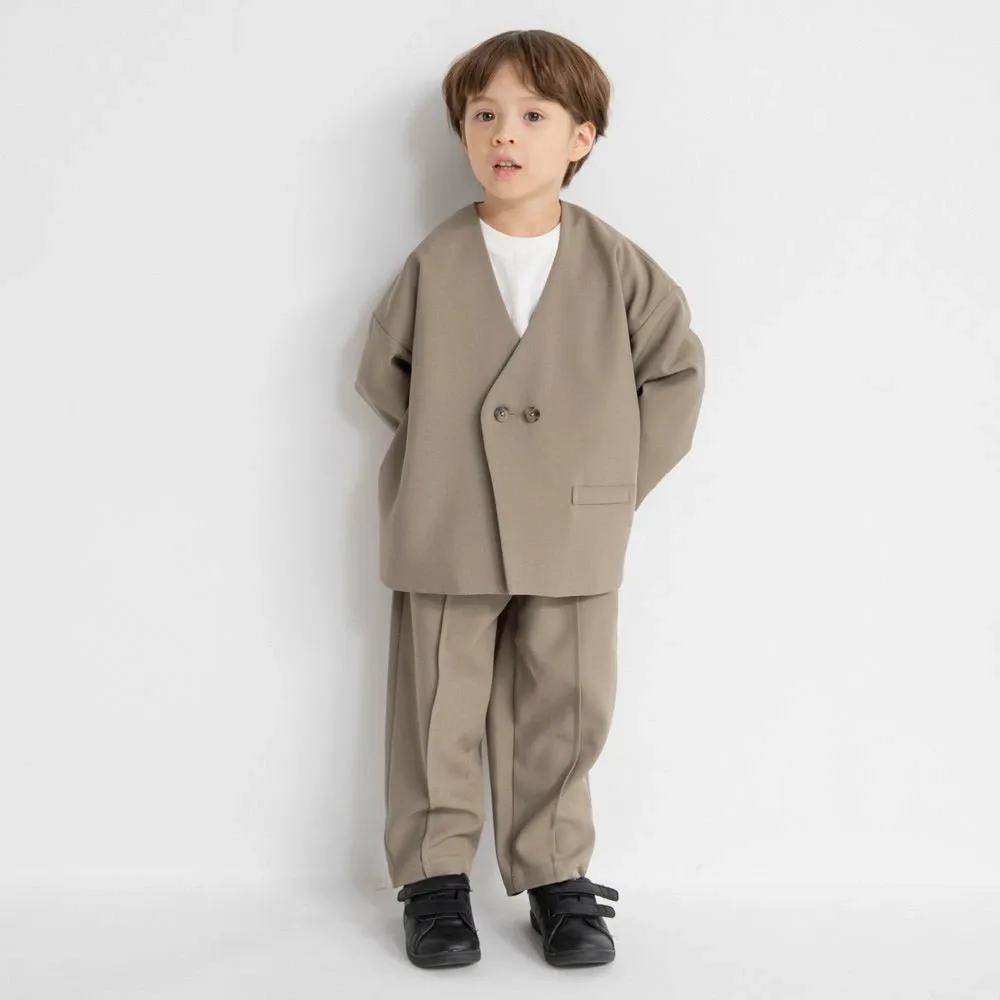 Комплект из двух предметов: пиджак без воротника и зауженные брюки. Branshes, beige
