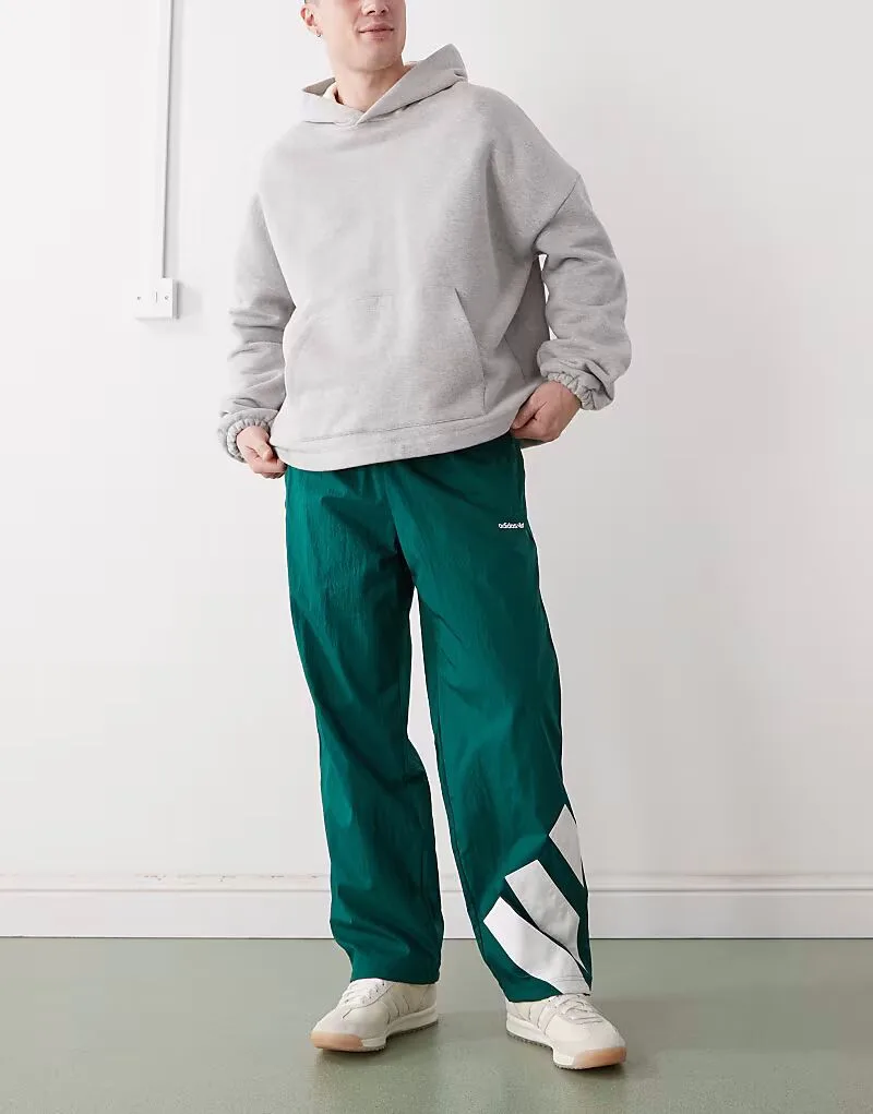 Спортивные брюки Adidas Originals Adicolor с контрастными вставками, зелено-белого цвета — фото 2