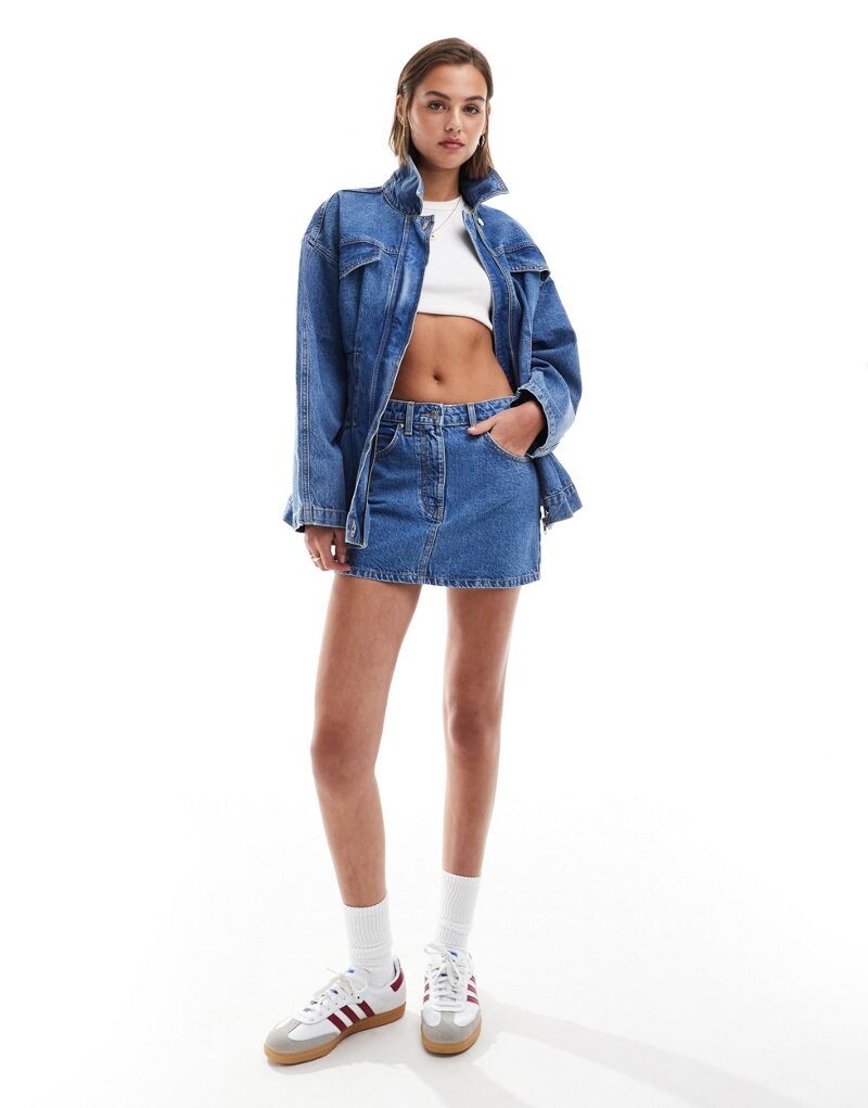 

Синяя джинсовая микроюбка средней степени стирки ASOS DESIGN