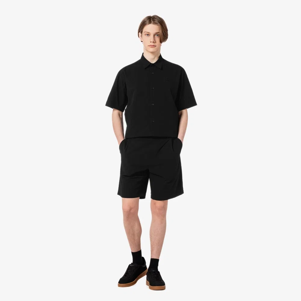 Мужские тканые шорты-бермуды чёрного цвета от Lacoste — фото 4