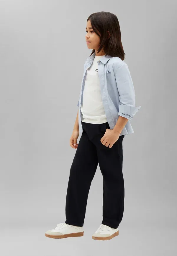 Брюки прямого кроя с текстурой Calvin Klein Jeans, черный — фото 2