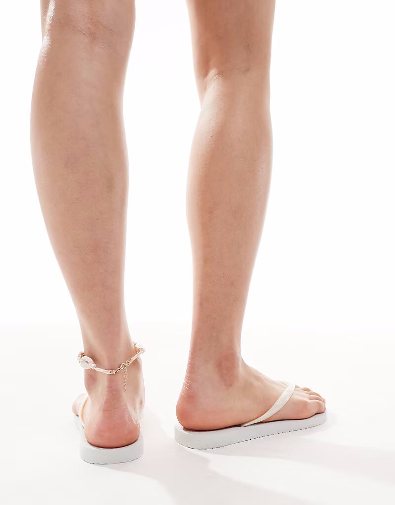 Узкие шлепанцы Havaianas белого цвета — фото 4