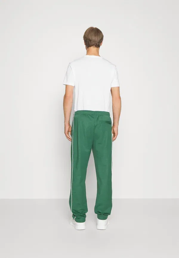 Спортивные штаны Lacoste, однотонные, зеленый — фото 3