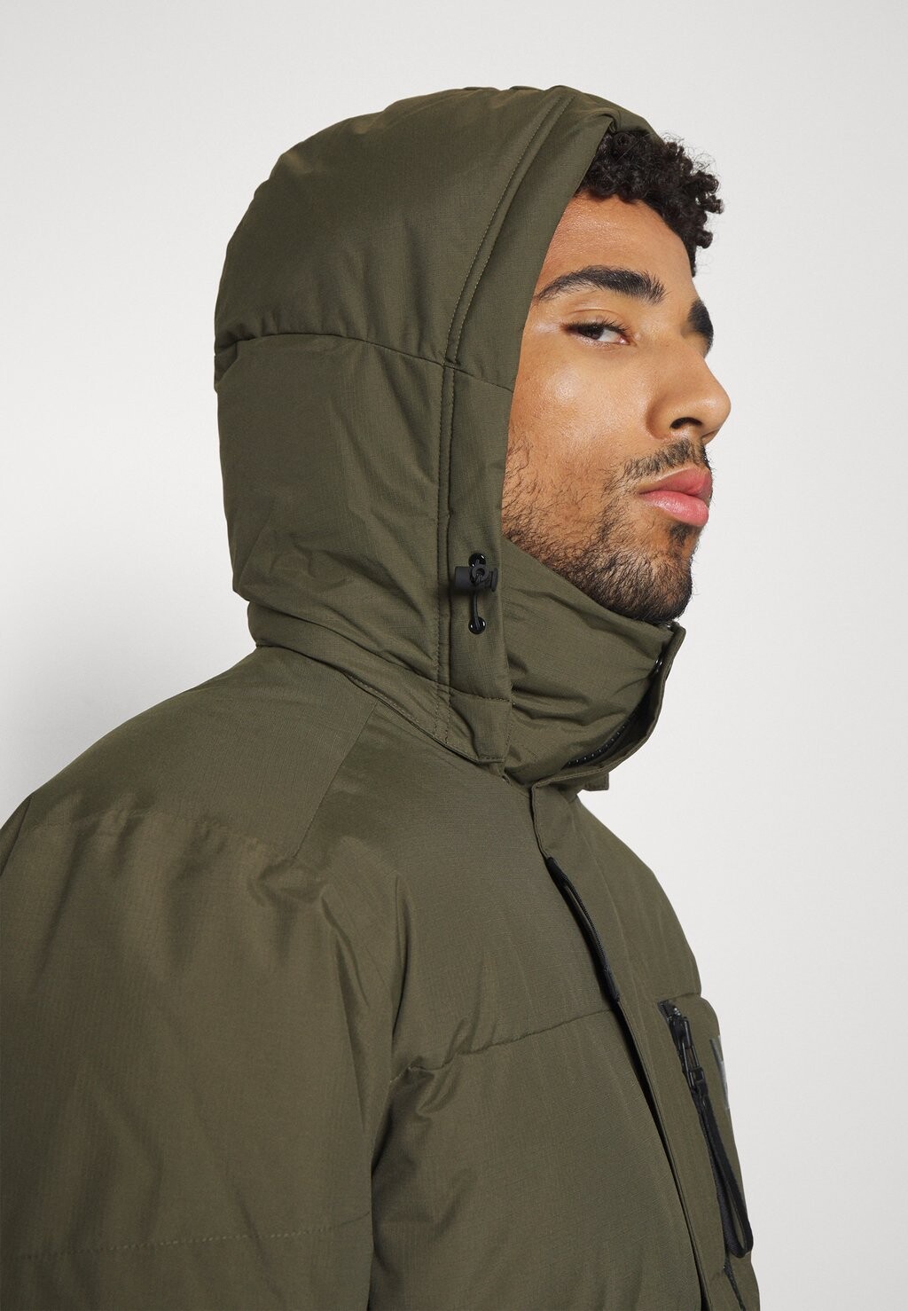 

Зимнее пальто TROMSOE Helly Hansen, хаки