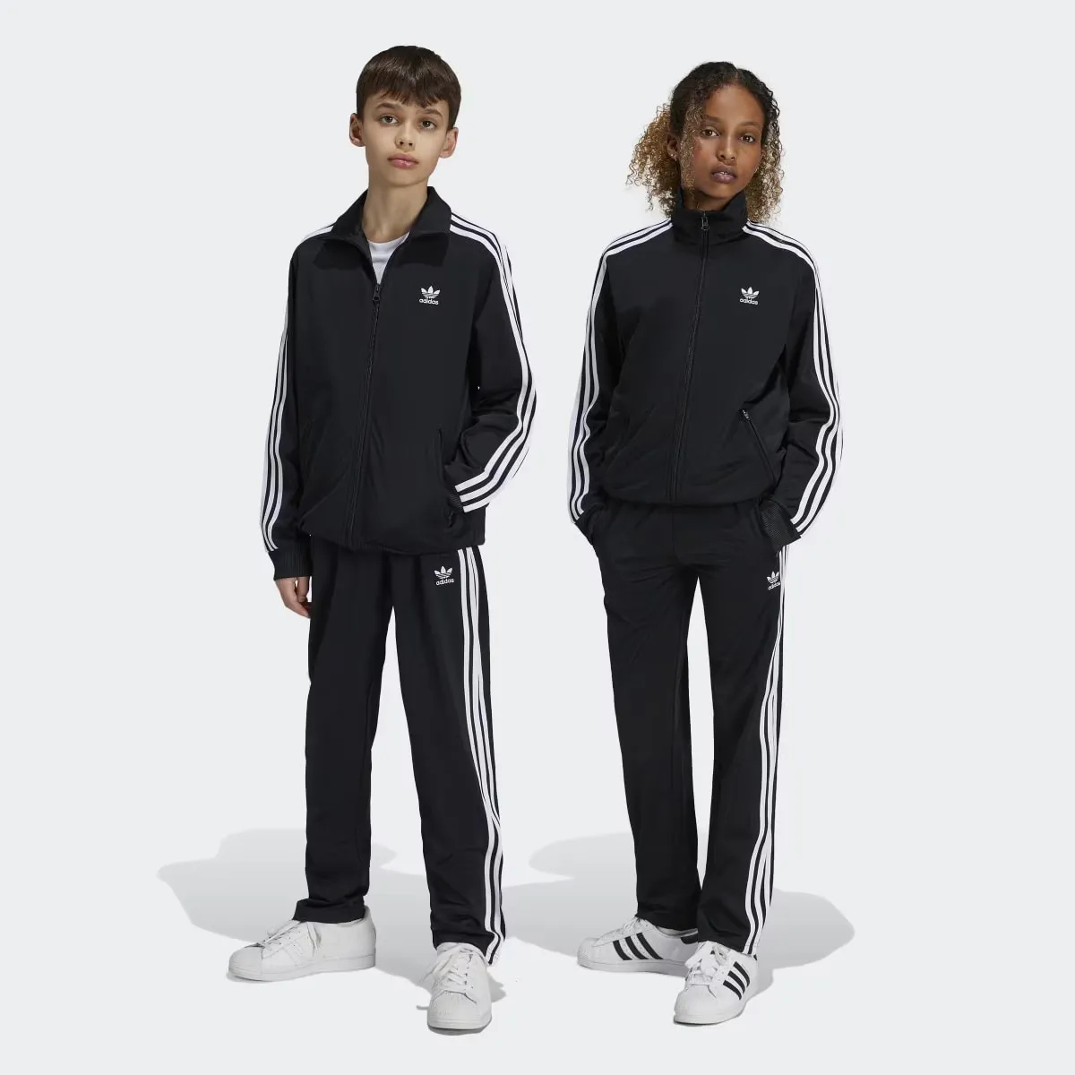 

Adicolor Firebird Детские брюки Adidas, чёрный