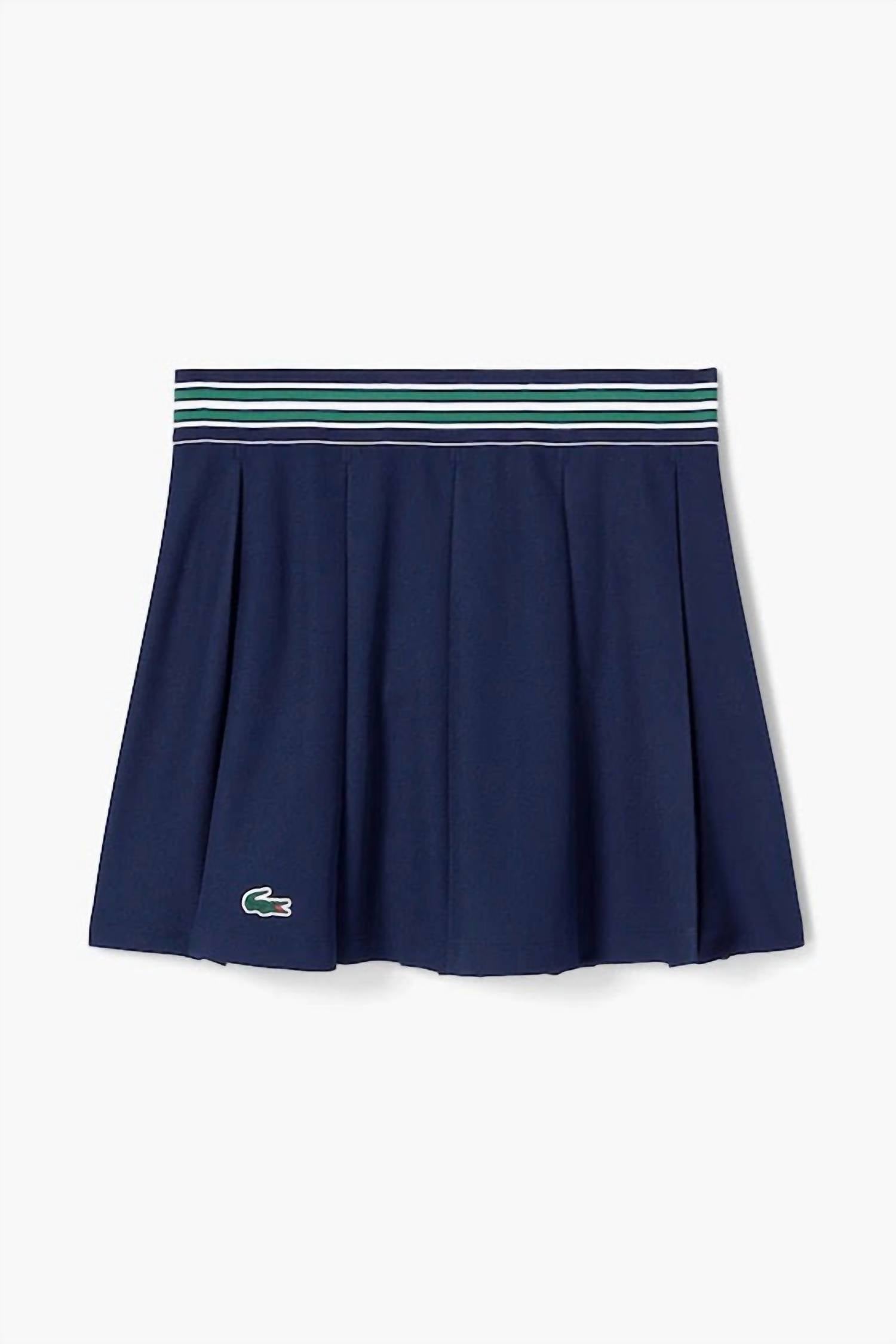 

Женская спортивная юбка-шорты из пике темно-синего цвета Lacoste