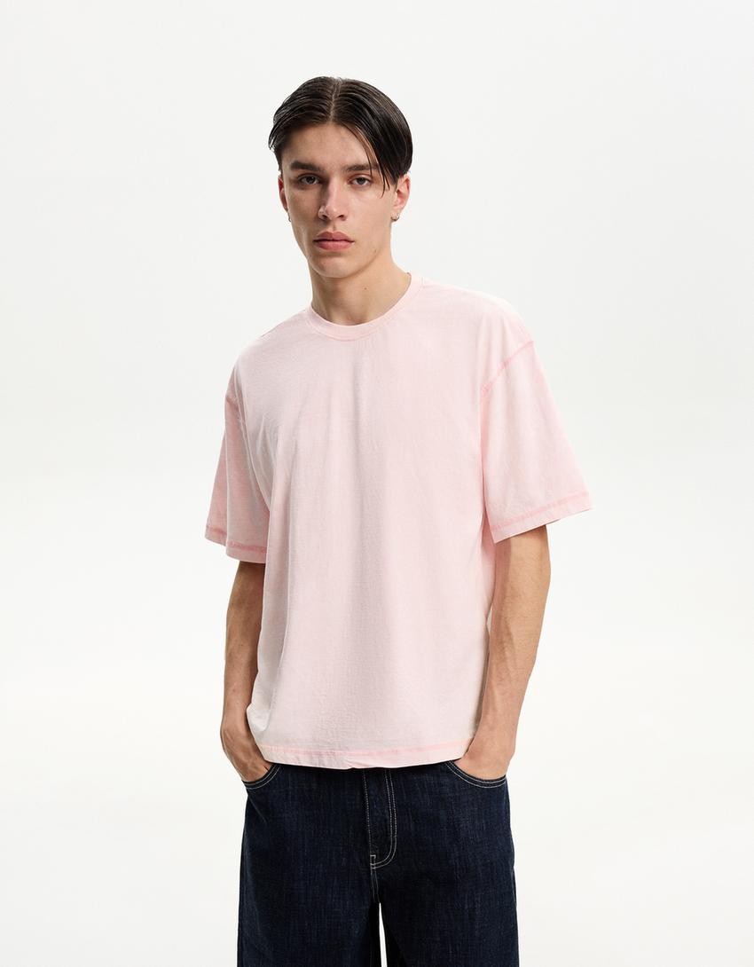 

Футболка с короткими рукавами и рваными краями Bershka, розовый