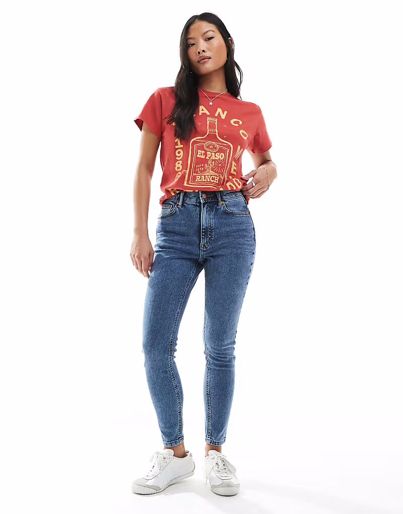 

Узкие джинсы ASOS DESIGN Petite Ultimate Skinny в средне-синем цвете ASOS Petite
