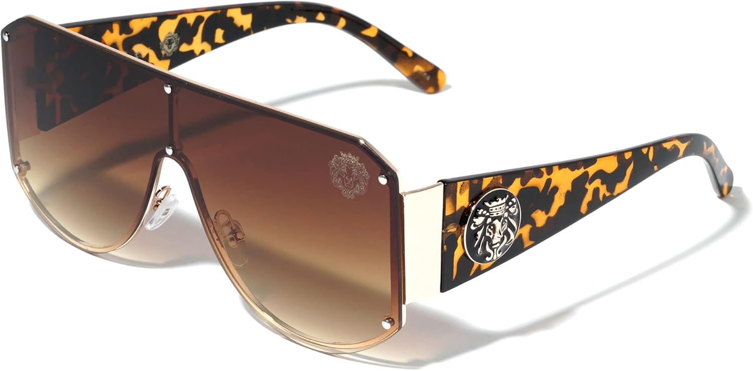 

Kleo Relic - Безободковые солнцезащитные очки в стиле хип-хоп с плоской верхней частью, заклепками, боковыми панелями в виде щита и медальоном в виде головы льва, Brown Demi