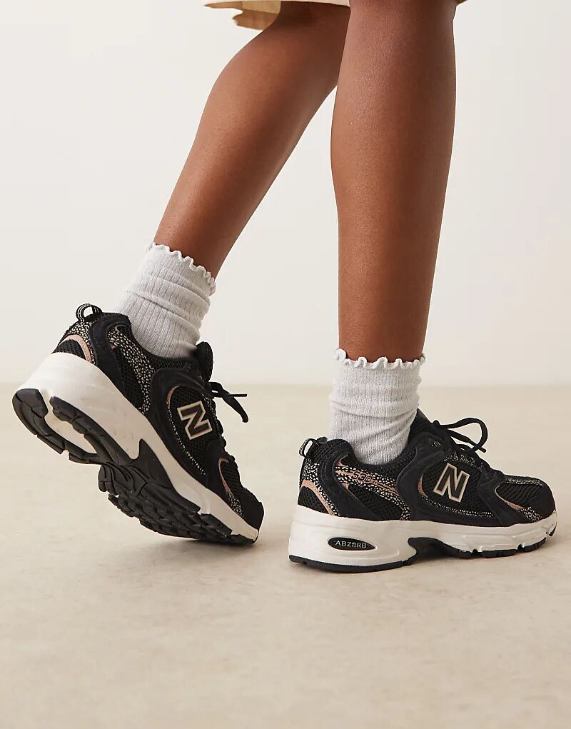 Кроссовки New Balance 530 черного цвета с леопардовым принтом — фото 4