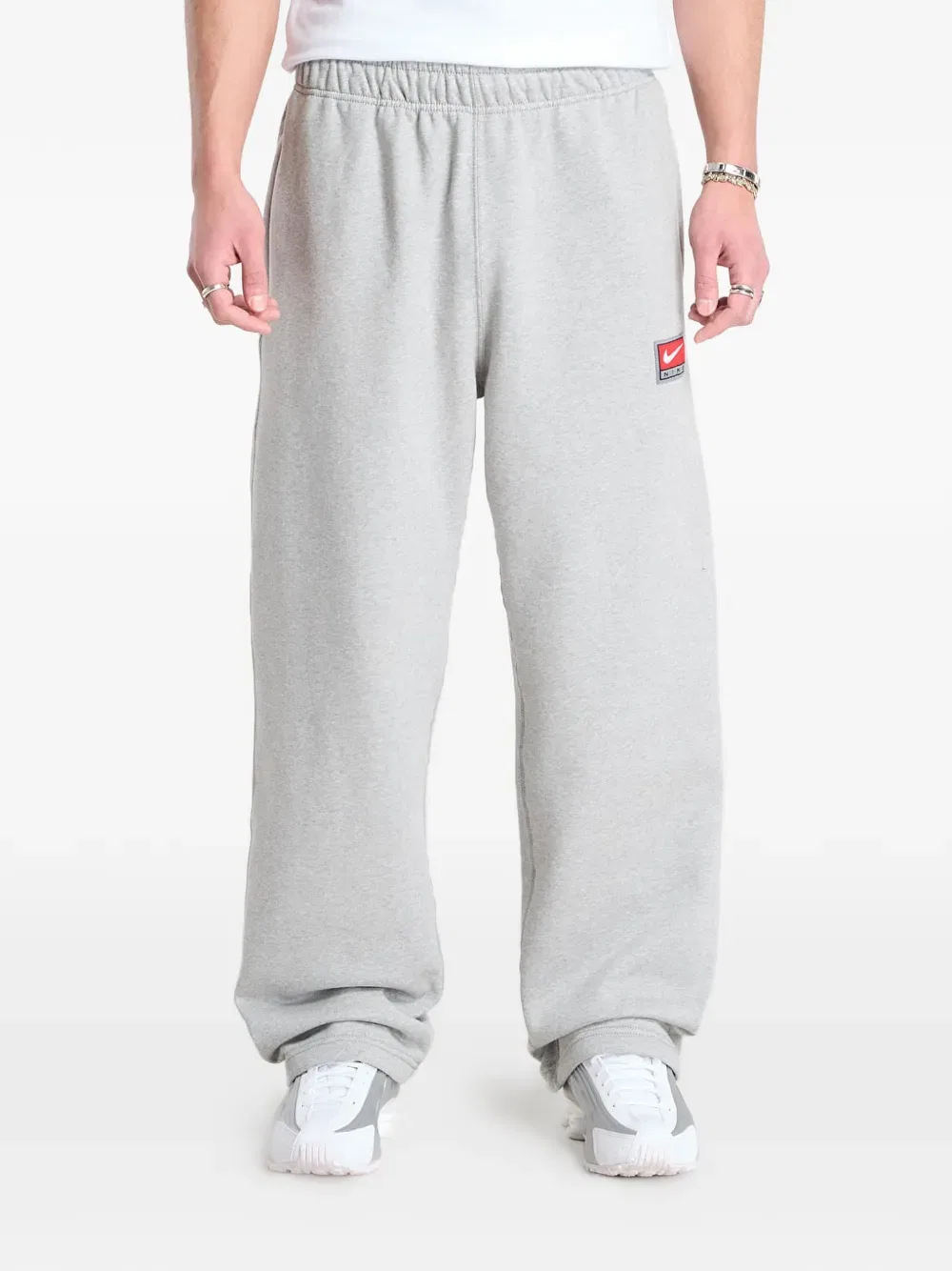 Спортивные брюки Solo Swoosh с открытым низом Nike, серый