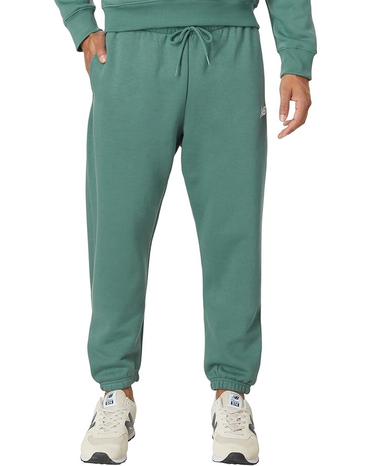 

Брюки New Balance Sport Essentials Fleece Joggers, цвет New Spruce