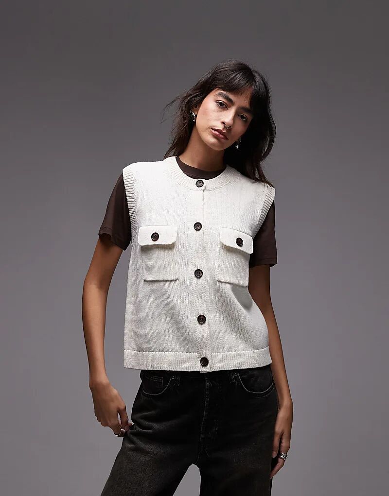 

Вязаный жилет ARKET с пуговицами спереди и накладными карманами в цвете «кремовый»