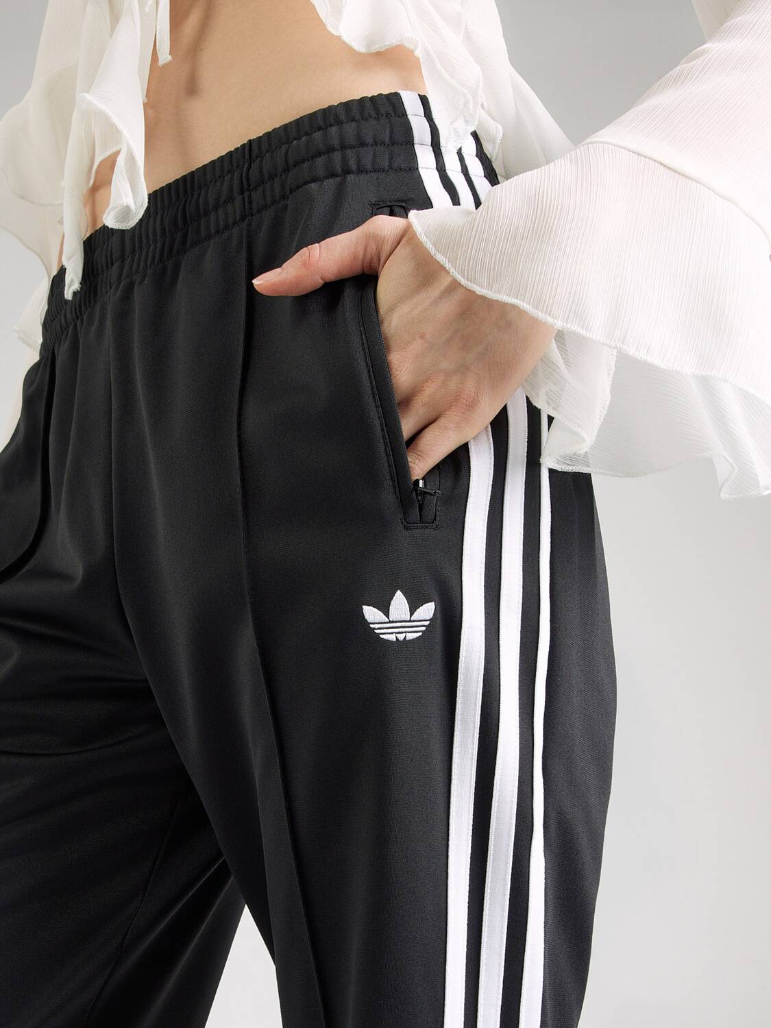 Adidas Originals Расклешенные брюки 'Firebird' в черном цвете — фото 2