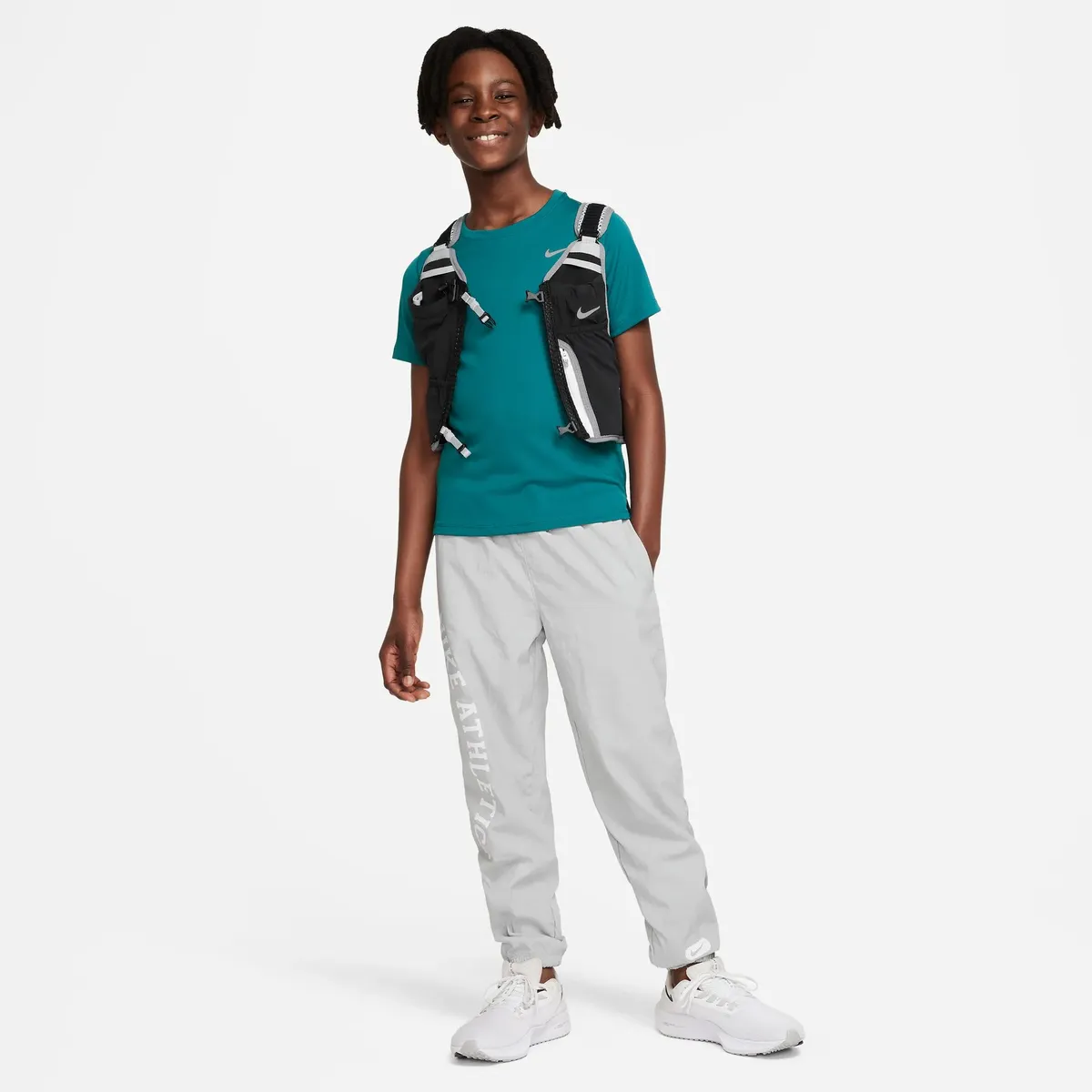 

Футболка для тренировок Nike "DRI-FIT MILER BIG KIDS (BOYS) SHORT-SLEEVE TRAINING TOP", цвет Geode Teal/Reflective Silv