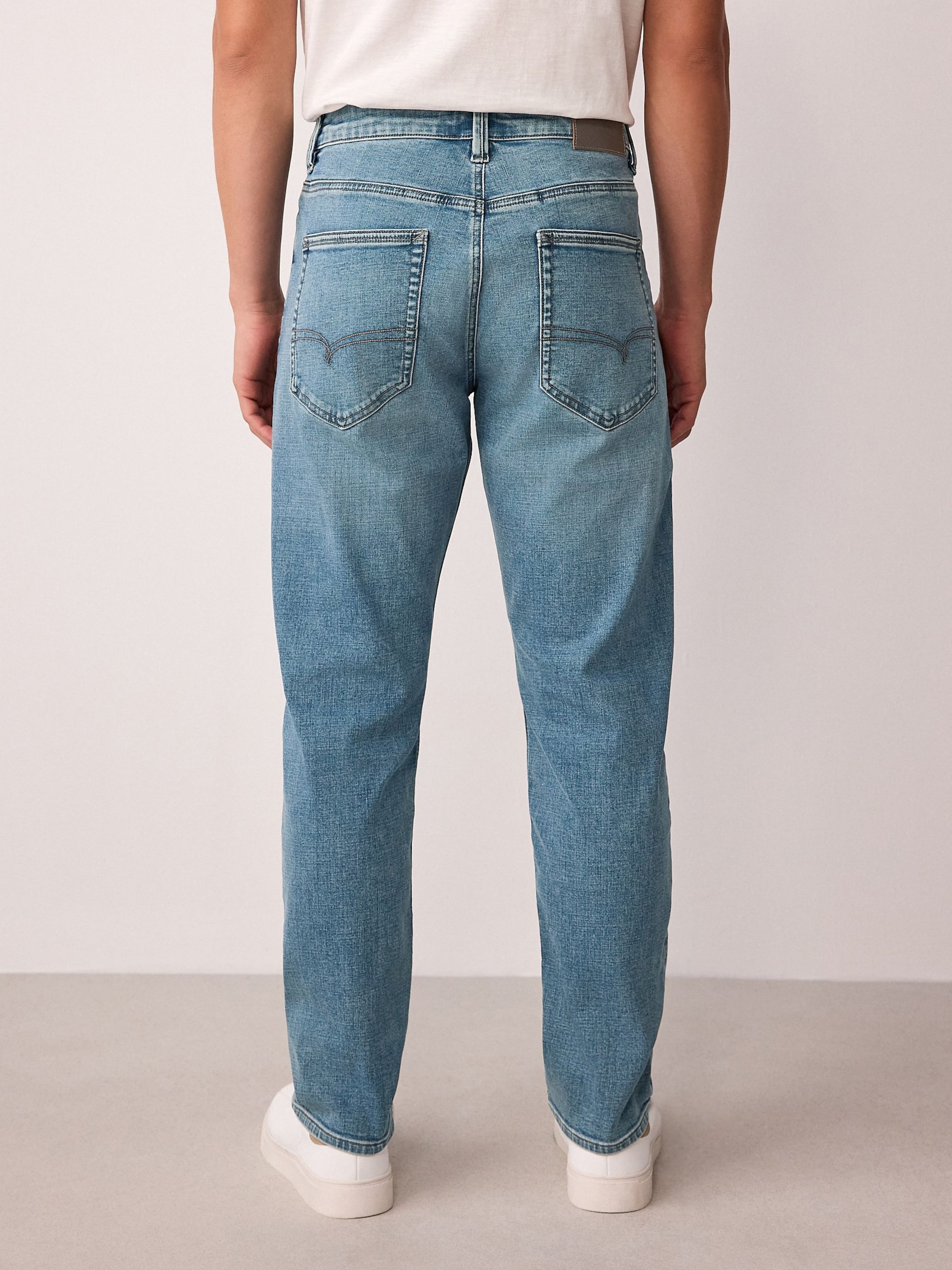 Next Джинсы Slim fit в светло-голубом цвете — фото 2