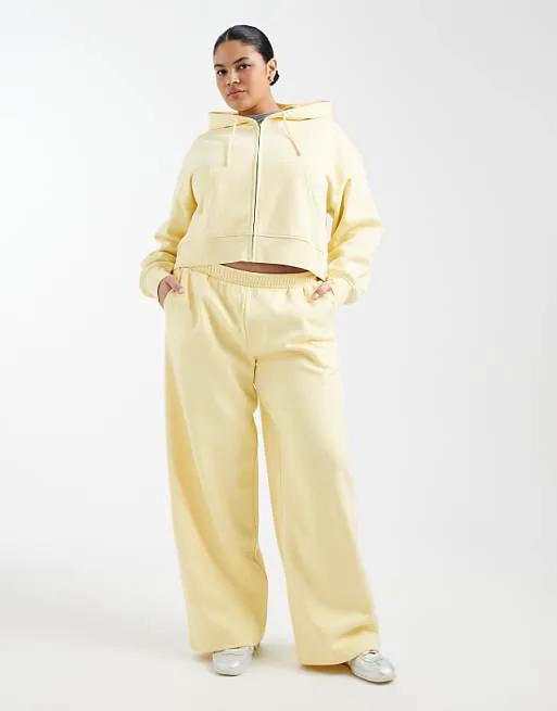 

Желтые джоггеры с широкими штанинами ASOS DESIGN Curve