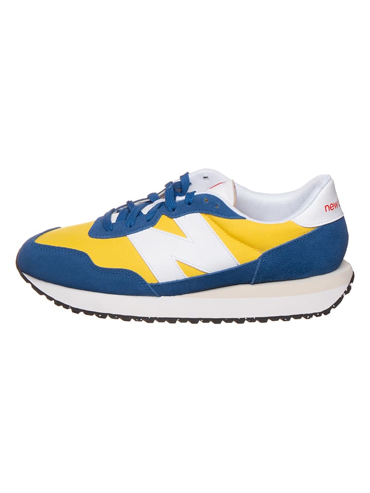 

Кроссовки на шнуровке New Balance, цвет blau/gelb