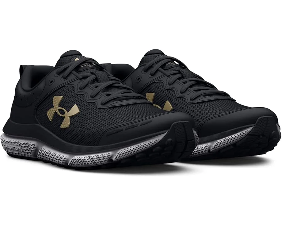 Кроссовки Under Armour Kids Assert 10 (Big Kid), Black/Black/Metallic GoldSee Less