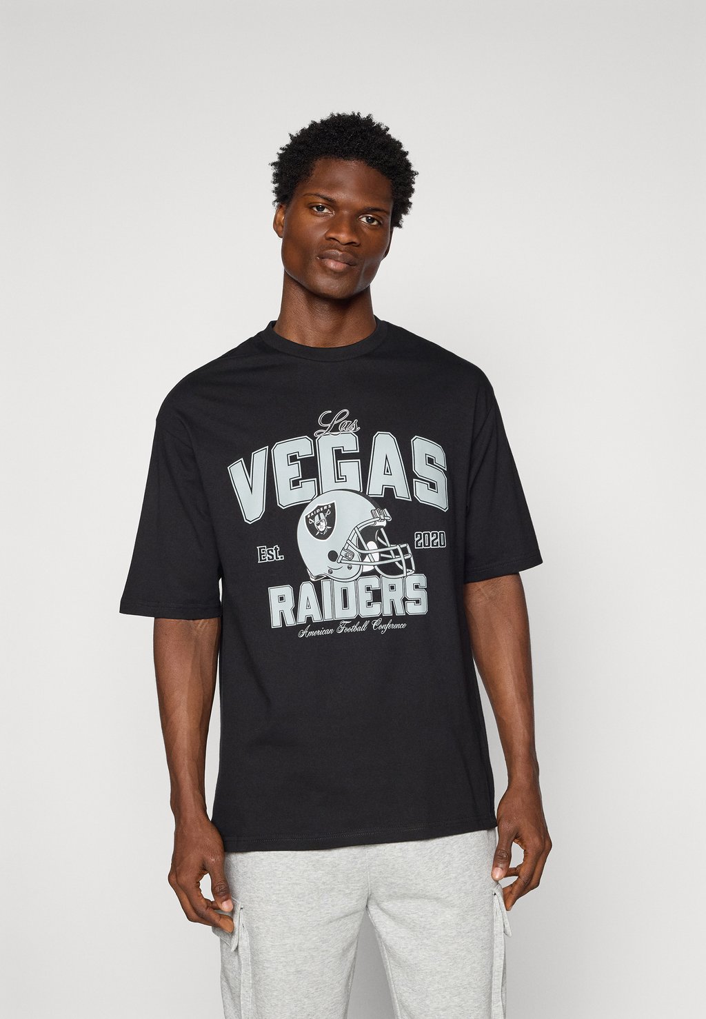 

Футболка с принтом NFL LAS VEGAS RAIDERS HELMET TEE - Club wear New Era, черный
