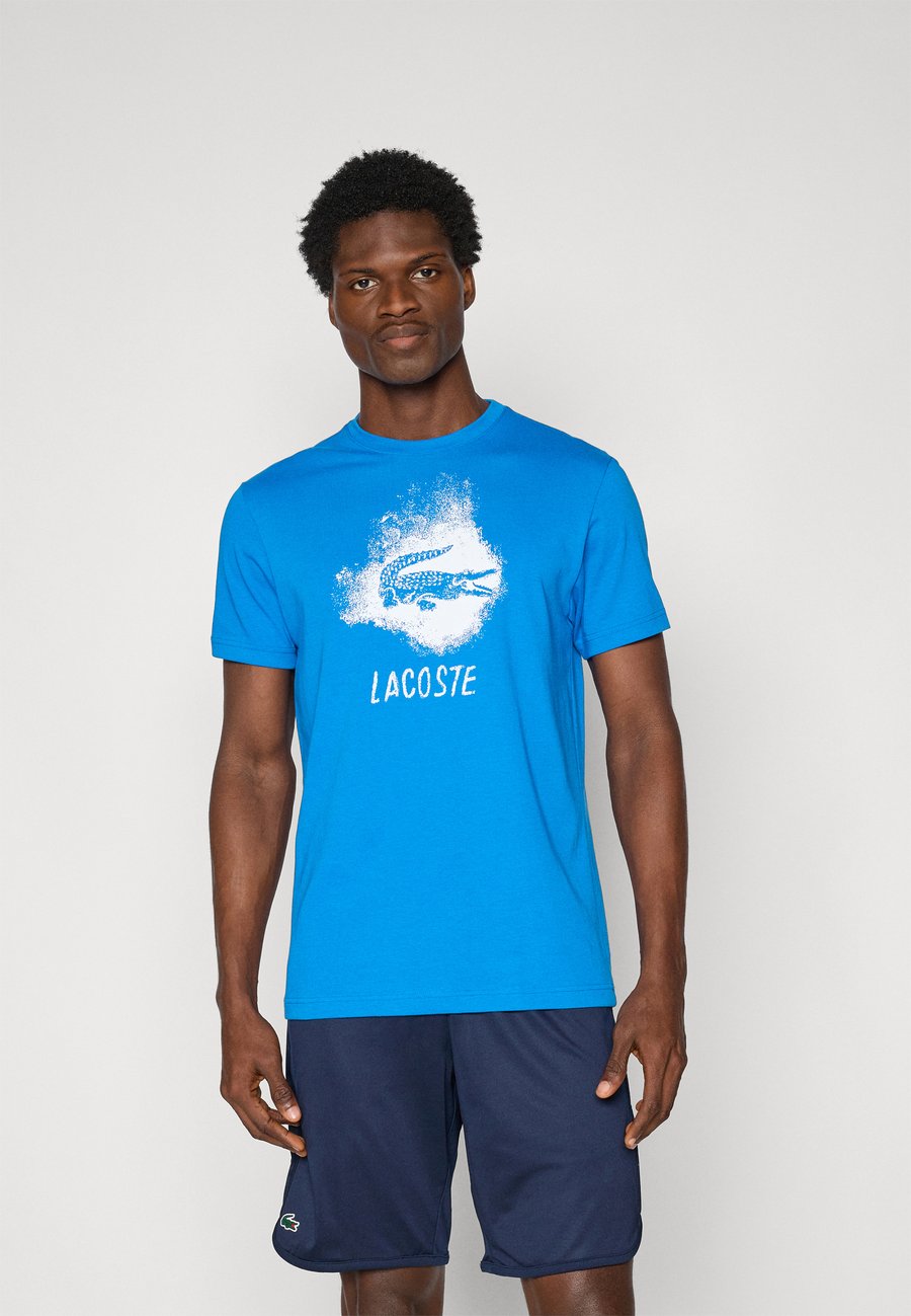 

Спортивная футболка Lacoste Sport GRAPHIC, Gipsy Blue/Blue