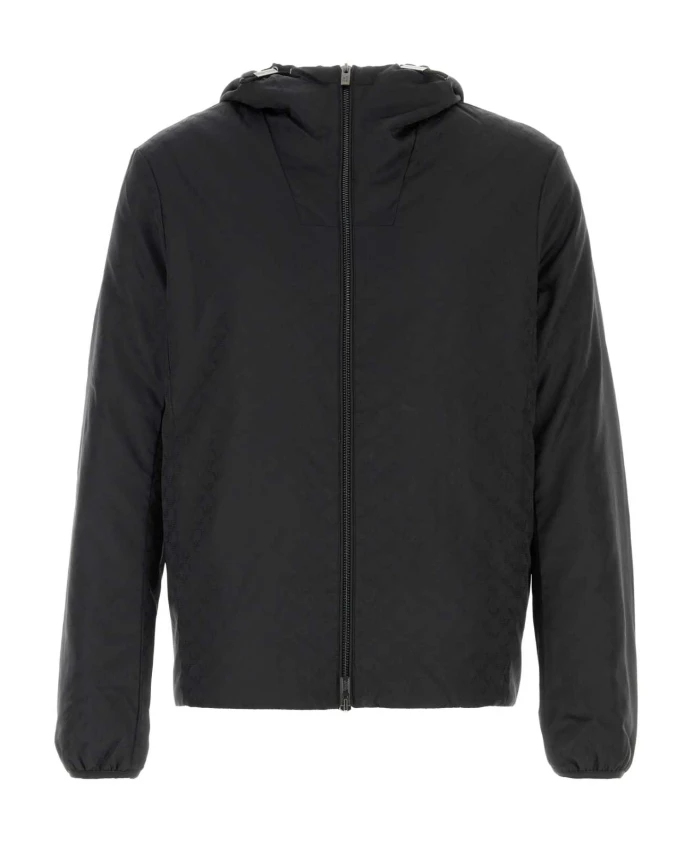 

Черная стеганая куртка в сочетании с пиджаком и жилетом. Emporio Armani, черный