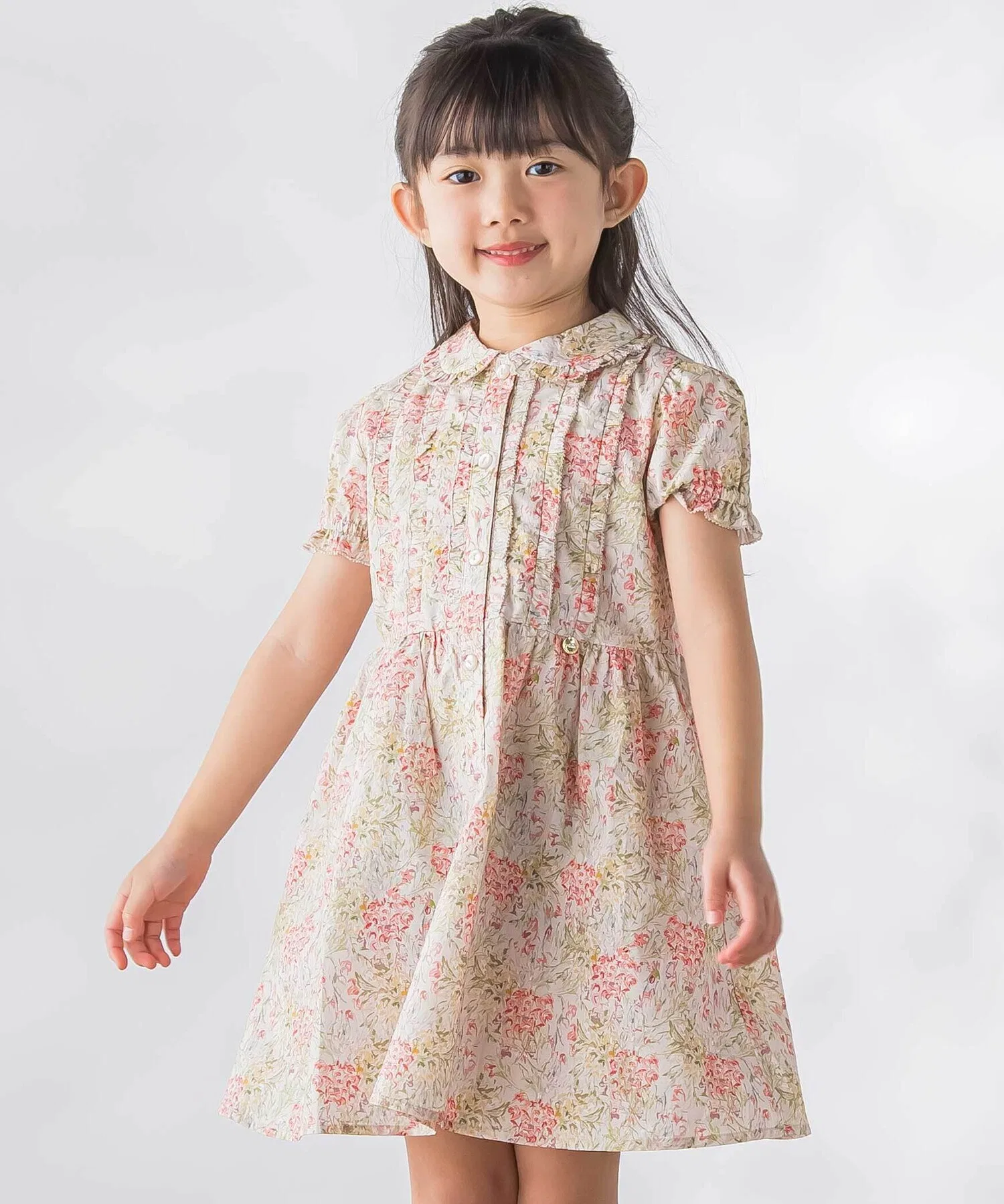 Детское платье с цветочным принтом BeBe Petits Pois Vert бежевое