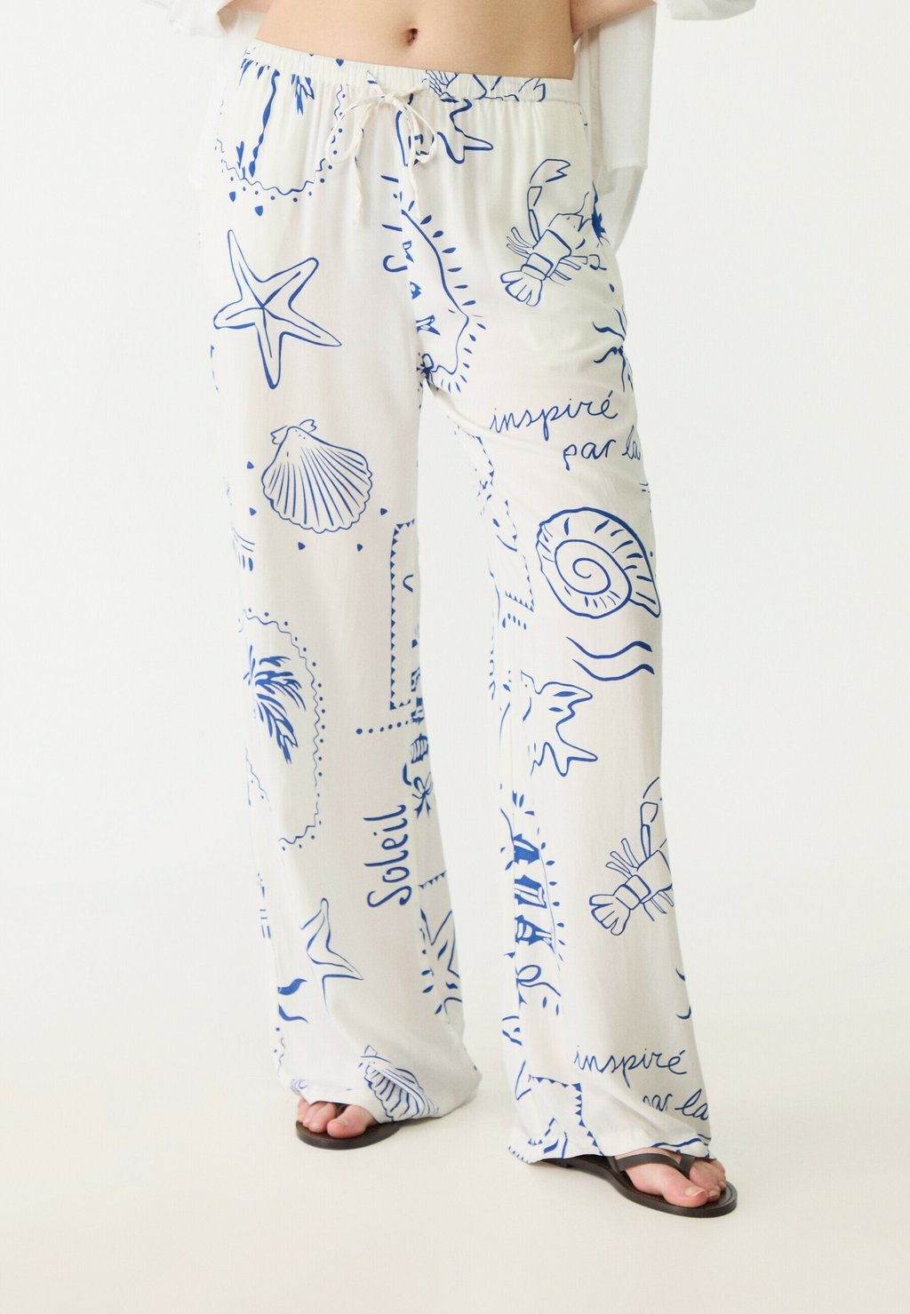 

Брюки LONG PRINTED FLOWY Stradivarius, бежевый