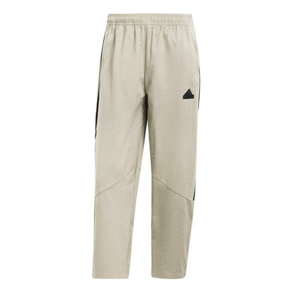 

Брюки tiro woven trousers asia sizing 'beige black' Adidas, бежевый