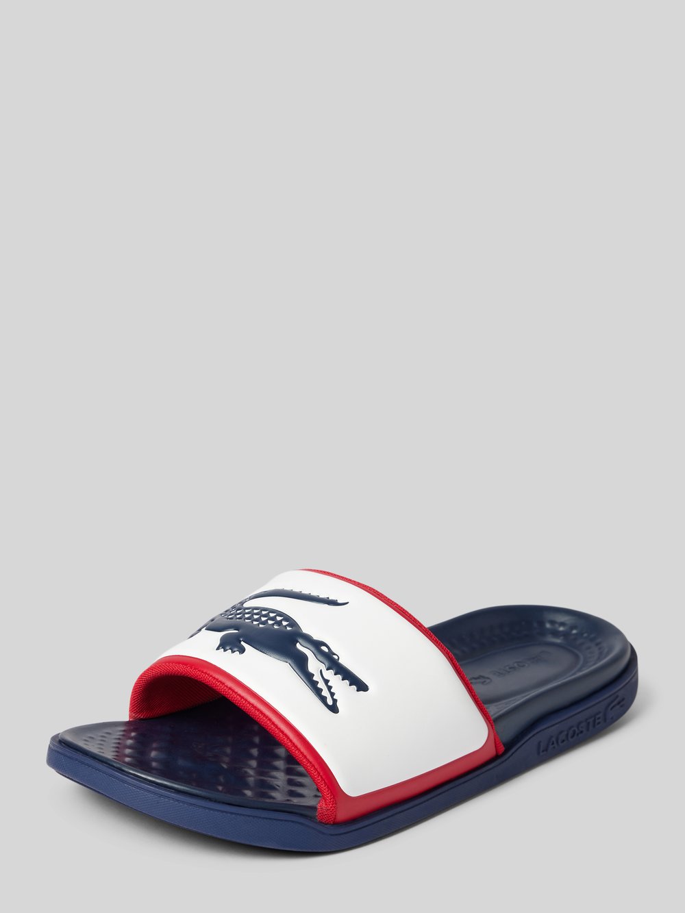 

Слайды с этикеткой детали модели «SERVE» Lacoste, белый