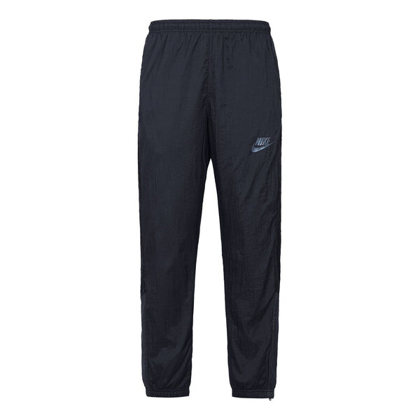 

Брюки sportswear woven zipper sports long pants black Nike, черный