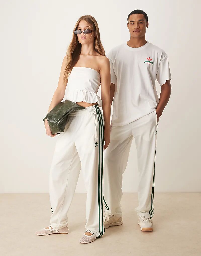 

Спортивные брюки adidas Originals Firebird кремового и зеленого цветов