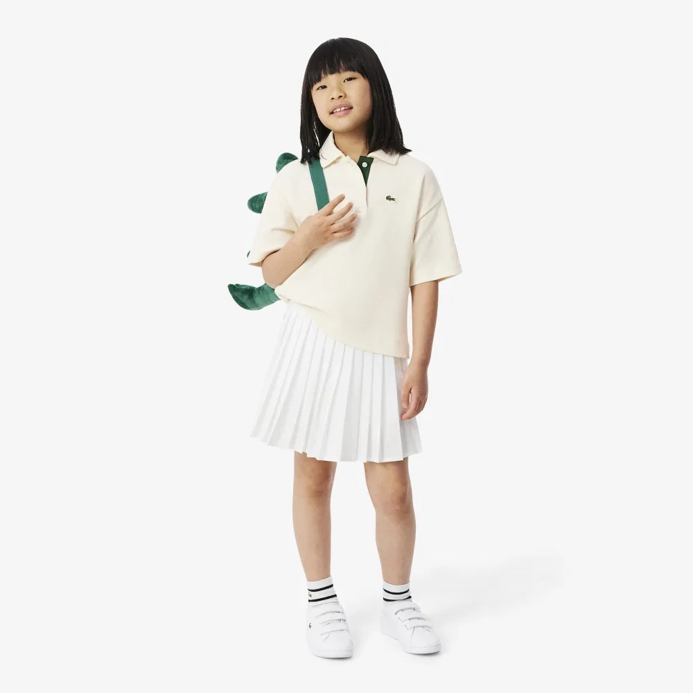 Детская рубашка-поло свободного кроя с коротким рукавом кремового цвета от Lacoste — фото 4
