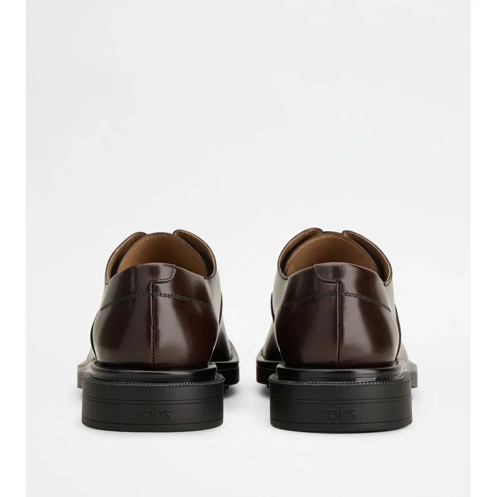 Tod's Lace-ups in Leather, коричневый — фото 3