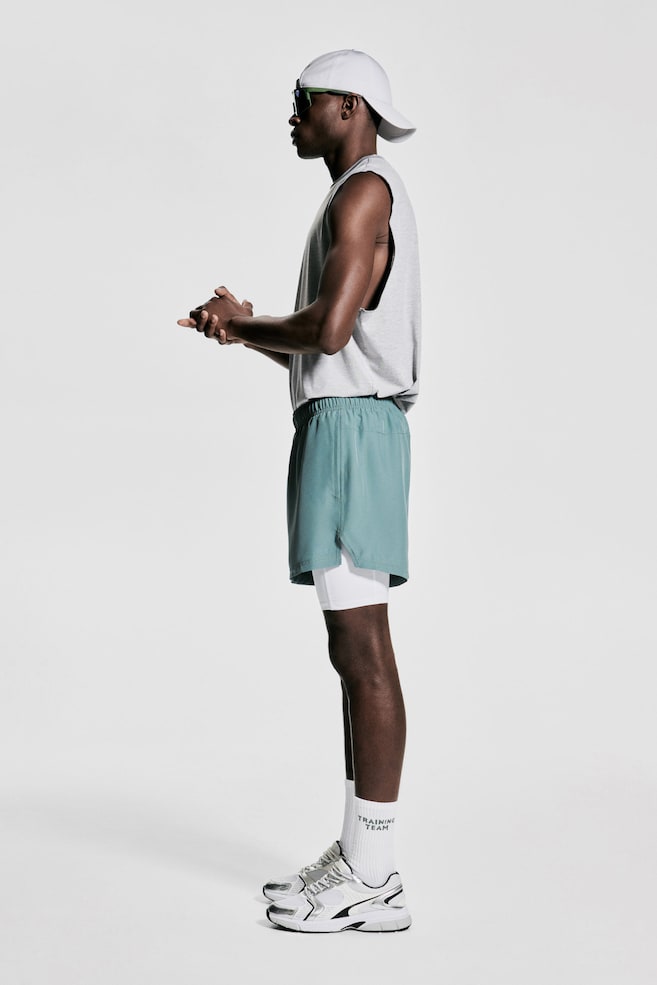 

Двухслойные спортивные шорты с технологией DryMove H&M, бирюзовый