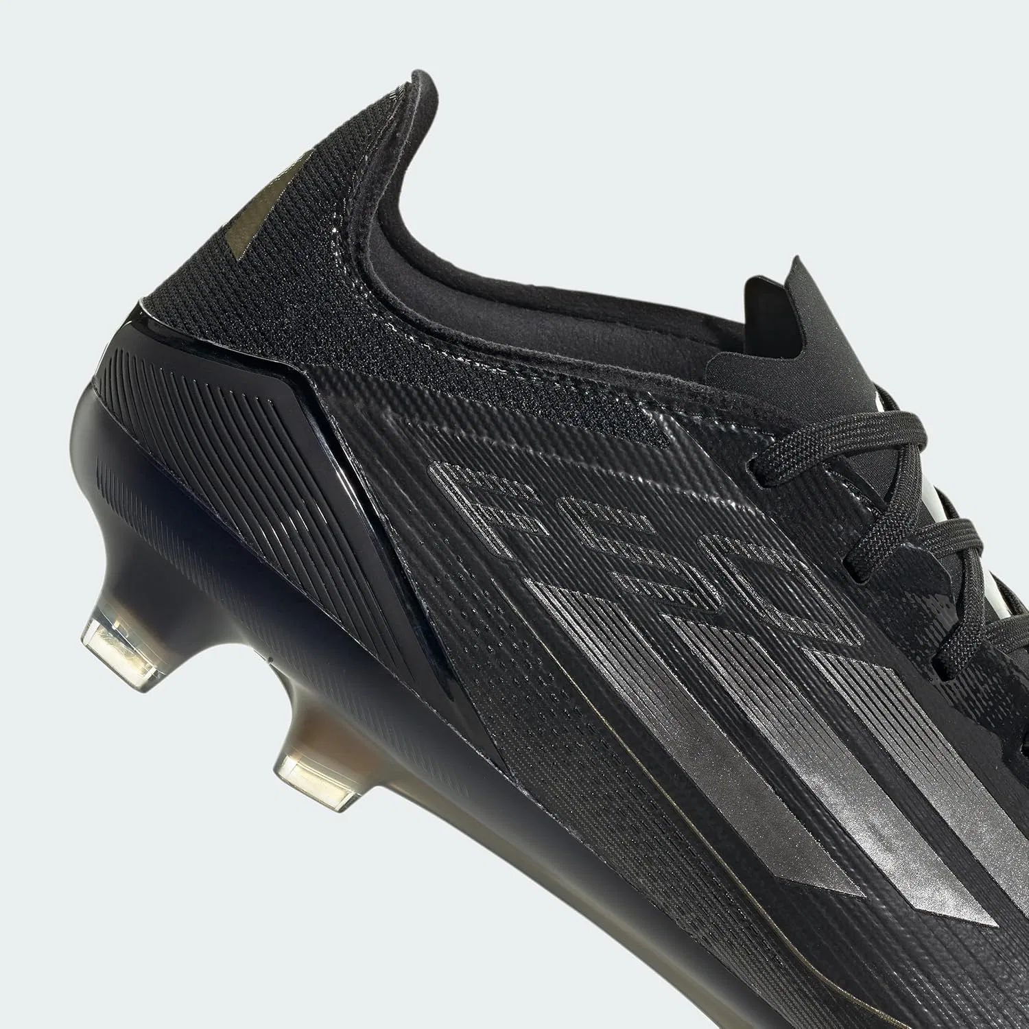 Кроссовки Adidas Unisex F50 Pro для твердого грунта, Core Black Iron Met Gold Met — фото 4