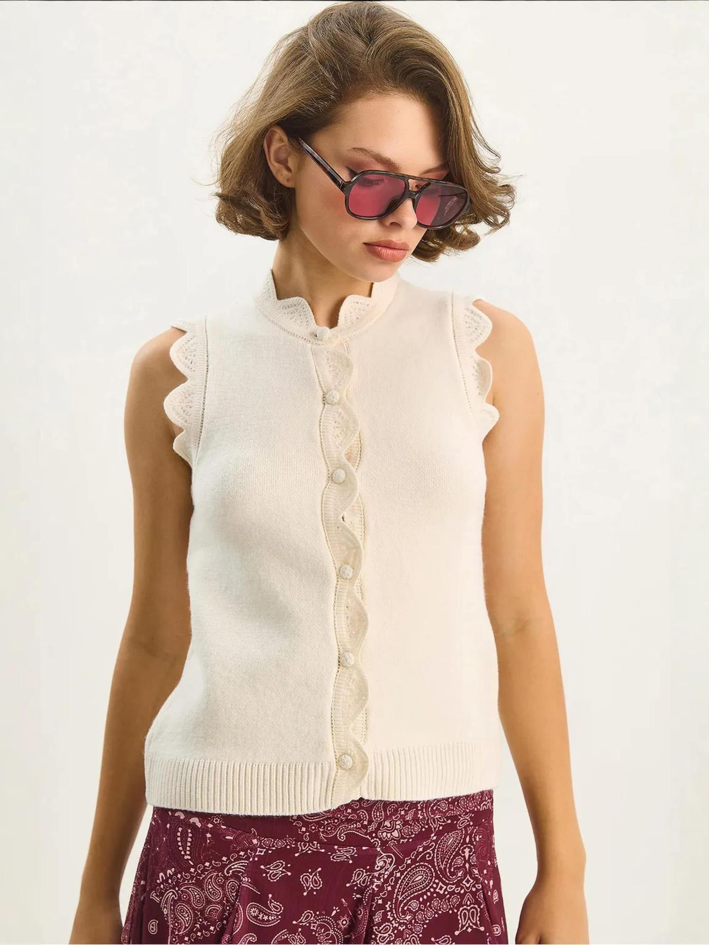 

Bianco Lucci Вязаный жилет в натуральном белом