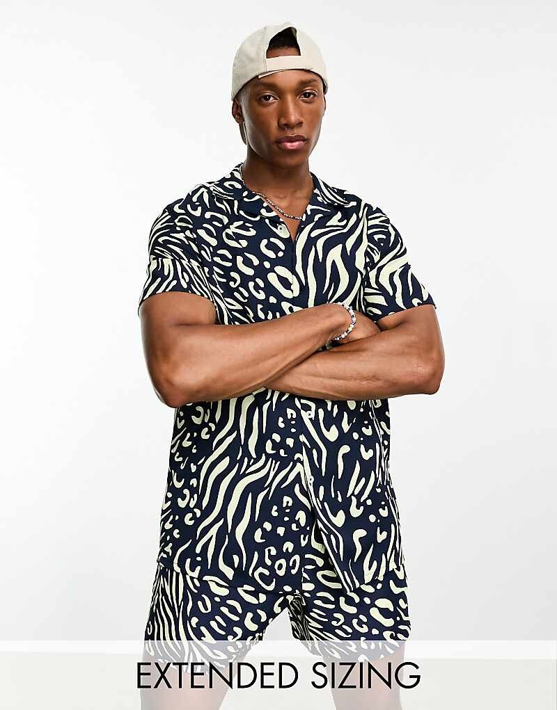 

ASOS DESIGN – Темно-синяя рубашка с узором, воротником с лацканами и зебровым принтом, однотонная