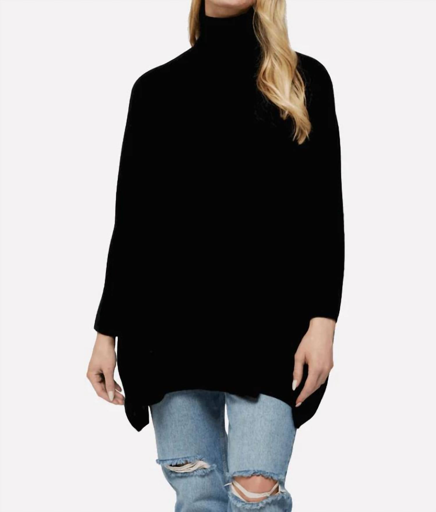 

ДжоДжо Пончо в черном цвете Brodie Cashmere