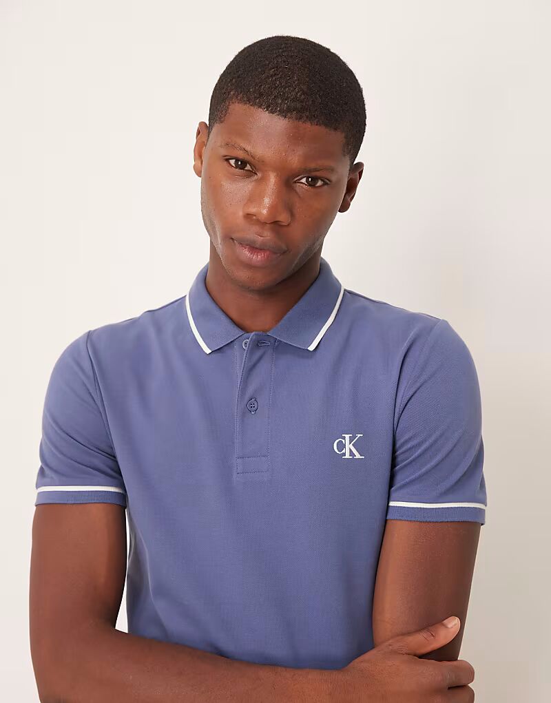 

Поло с кантом Calvin Klein Jeans в выцветшем синем цвете