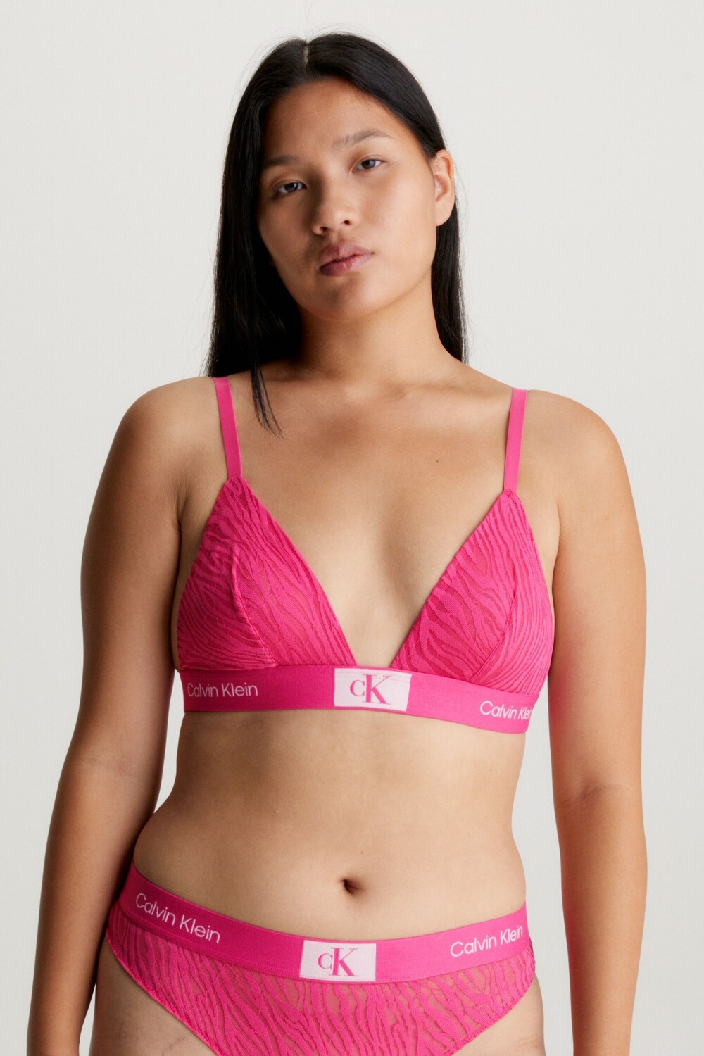 

Кружевной бюстгальтер с треугольными чашками и животным принтом Calvin Klein, розовый