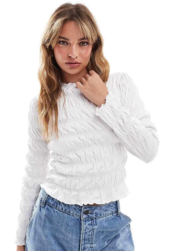 

Белый топ с высоким воротником и рифлеными рукавами ASOS DESIGN